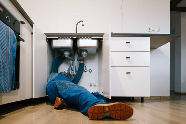 Professional Drain Cleaning technician working in Deer Island, OR